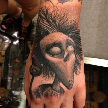 Jon von Glahn - buton tim vincent black and grey hand tattoo